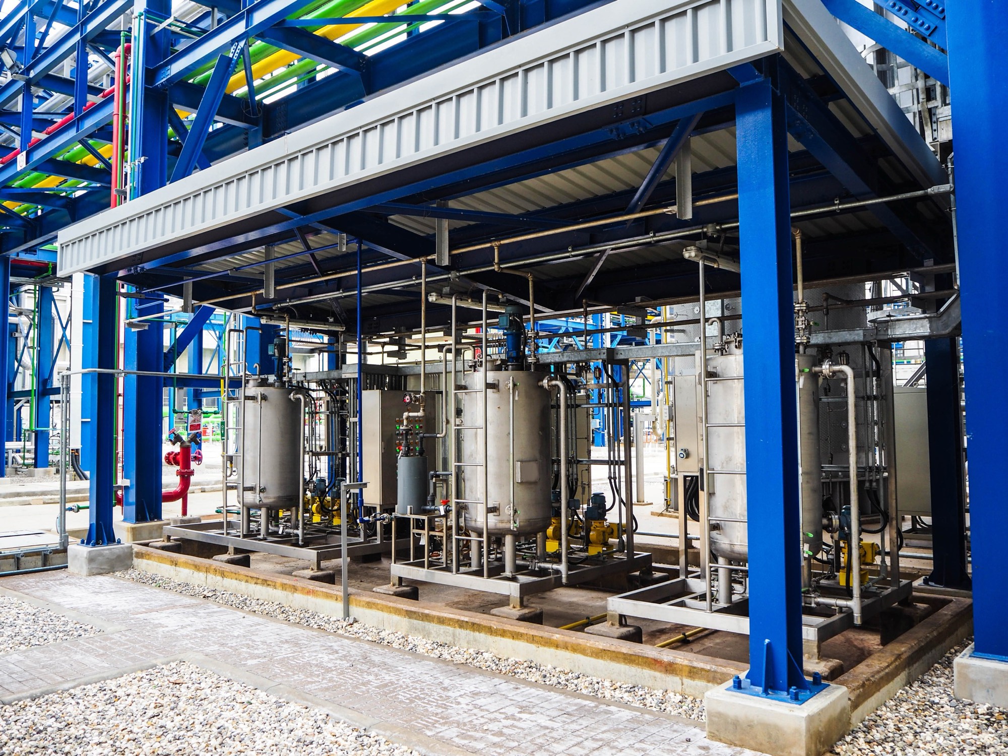 Chemical dosing systems and tanks in an industrial plant
