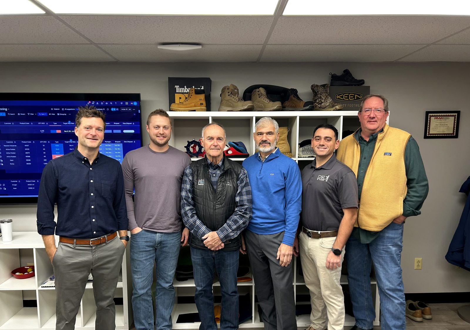 The P.A.T. Products team with partners from REPI at the company's Hermon, Maine facility