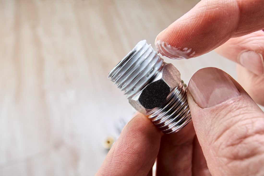 Sealant on a threaded pipe fitting, a pipe-thread and gasket sealant