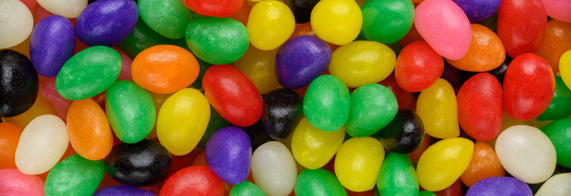 Glossy glazed jelly beans, a confectioner's glaze of food-grade shellac
